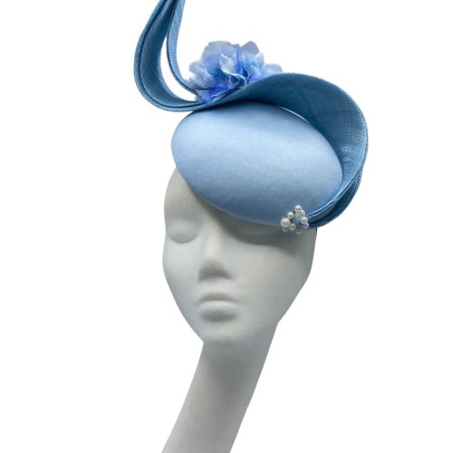 Ice blue structured headpiece.